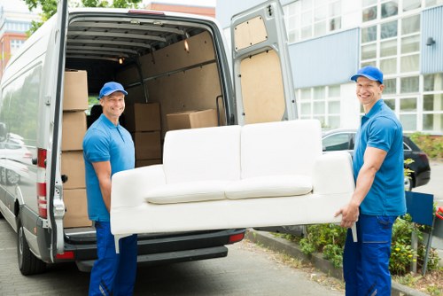 Removal van service navigating a Camden residential street
