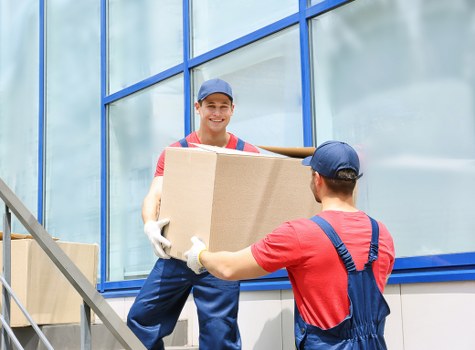 Removal truck and moving team prepared for a Camden house relocation