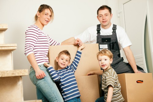 Removal team helping with a Camden flat move on a narrow street