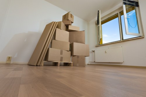 Moving van and boxes outside a Camden residential street