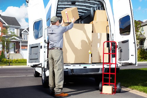 Furniture being carefully moved through a Camden apartment building