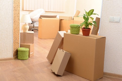 Packed boxes and furniture ready for a local Camden move