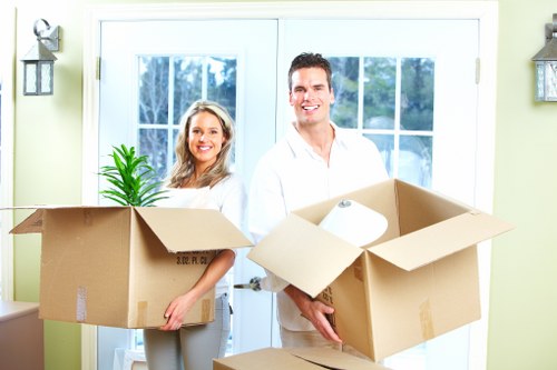 Packed household boxes ready for house removals in Camden